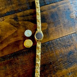 Gold watch  (broken)